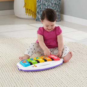 Juguete de piano para niños Deluxe Kick 'n Play Fisher-Price